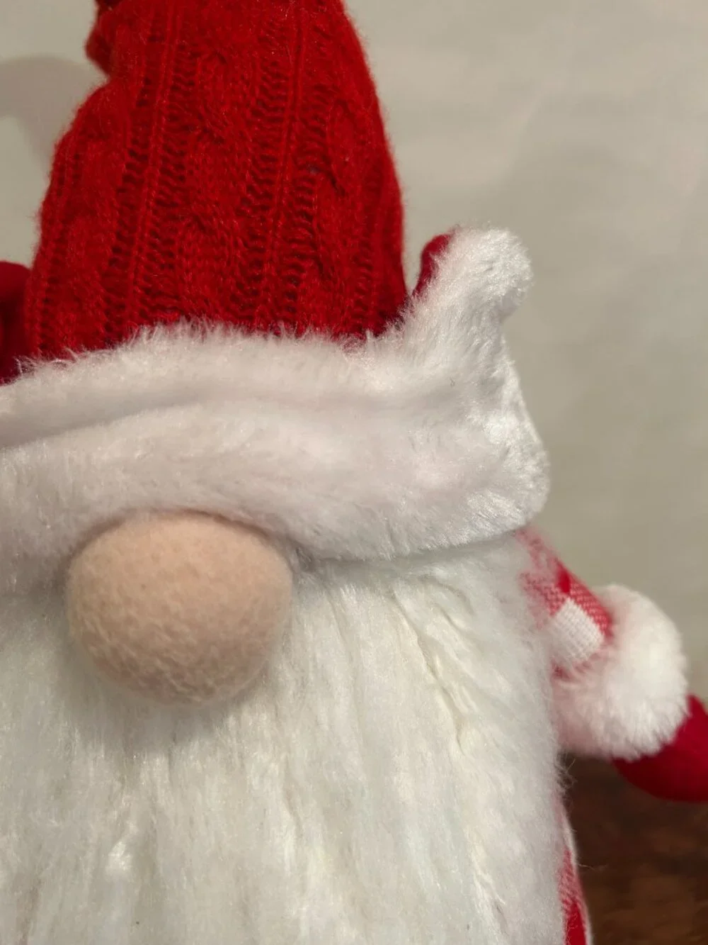 Christmas Holiday Gnome with red knit cap, red plaid torso, wispy white beard
